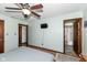 Serene bedroom featuring wood floors, ample space, and en-suite access to the bathroom at 22569 State Road 37 N, Noblesville, IN 46060