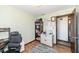 Comfortable bedroom with wood floors, a bookshelf, and warm, inviting decor at 22569 State Road 37 N, Noblesville, IN 46060