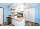 Functional kitchen with modern appliances, breakfast bar, and ample counter space at 22569 State Road 37 N, Noblesville, IN 46060
