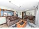 Cozy living room featuring hardwood floors, comfortable seating, and lots of light at 22569 State Road 37 N, Noblesville, IN 46060