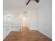 Bright hallway with wood floors featuring staircase access, perfect as a transition space at 2332 Brightwell Pl, Indianapolis, IN 46260