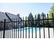 Community pool with a fence, providing a refreshing amenity for residents to enjoy during warm weather at 2332 Brightwell Pl, Indianapolis, IN 46260