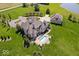 Sprawling estate featuring a backyard swimming pool, guest house, and well-manicured grounds at 2766 S Honey Creek S Rd, Greenwood, IN 46143