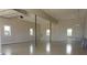 Spacious three-car garage featuring an open layout and ample room for vehicles and storage at 2766 S Honey Creek S Rd, Greenwood, IN 46143