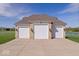 A detached three-car garage offers plenty of space for vehicles and storage at 2766 S Honey Creek S Rd, Greenwood, IN 46143