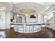 Stunning kitchen with white cabinetry, a large island, and modern pendant lighting at 2766 S Honey Creek S Rd, Greenwood, IN 46143