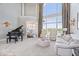 Bright living room features grand piano, comfortable seating, and a large window view at 2766 S Honey Creek S Rd, Greenwood, IN 46143