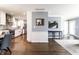 Open concept interior showcasing hardwood floors, a neutral color palette, and seamless flow between rooms at 320 E 86Th St, Indianapolis, IN 46240