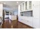 Modern kitchen with white cabinetry, stainless steel appliances, and an open layout for entertaining at 320 E 86Th St, Indianapolis, IN 46240
