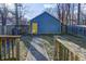 Charming backyard features a detached garage with a yellow door at 3224 N Capitol Nw Ave, Indianapolis, IN 46208