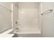 Bathroom with tile walls, and bathtub-shower combination at 3224 N Capitol Nw Ave, Indianapolis, IN 46208
