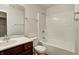 Bathroom with vanity, tile, and a shower-tub combination at 3224 N Capitol Nw Ave, Indianapolis, IN 46208