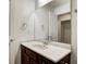 Bathroom featuring wood vanity with sink, and large mirror at 3224 N Capitol Nw Ave, Indianapolis, IN 46208