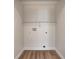 Dedicated laundry room area featuring washer and dryer hookups and shelf at 3224 N Capitol Nw Ave, Indianapolis, IN 46208