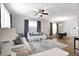Open-concept living room featuring ample seating and natural light at 3224 N Capitol Nw Ave, Indianapolis, IN 46208