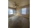 Bedroom features two windows providing ample natural light and carpeted floors at 3614 N Whittier Pl, Indianapolis, IN 46218