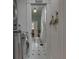 Hallway that shows laundry on left and bathroom straight ahead at 37 N Main St, Indianapolis, IN 46227