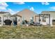 This home's backyard features a concrete patio with an outdoor kitchen, perfect for outdoor entertaining at 4318 Ballybay Ln, Indianapolis, IN 46239
