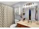 Bathroom featuring a single sink vanity and a shower with a patterned curtain at 4318 Ballybay Ln, Indianapolis, IN 46239