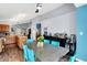 Dining area, modern decor, open kitchen, and wood floors at 4318 Ballybay Ln, Indianapolis, IN 46239