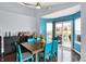 Dining area, modern seating, and sliding glass doors at 4318 Ballybay Ln, Indianapolis, IN 46239