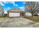 A single Gathering home with a two car garage and a concrete drive with mature trees at 4318 Ballybay Ln, Indianapolis, IN 46239
