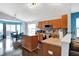 Open kitchen and dining area, lots of natural light, wood floors at 4318 Ballybay Ln, Indianapolis, IN 46239