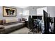 Cozy room featuring a comfortable couch and an office setup at 4318 Ballybay Ln, Indianapolis, IN 46239