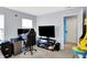 Spacious room featuring a dual monitor setup and stylish furniture at 4318 Ballybay Ln, Indianapolis, IN 46239