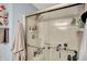 Bathroom featuring a shower with glass doors and chrome fixtures at 4318 Ballybay Ln, Indianapolis, IN 46239