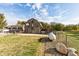 Extensive backyard view showcases a barn, house, and ample green space, ideal for outdoor activities at 4533 W 600 N, Fairland, IN 46126