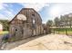 Barn exterior features wood paneling, a basketball hoop, and a quirky cartoon figure, set against a sunny sky at 4533 W 600 N, Fairland, IN 46126