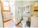 Bathroom featuring a walk-in shower with glass door and updated fixtures at 4533 W 600 N, Fairland, IN 46126