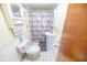 Cozy bathroom featuring a tub, toilet and sink at 4533 W 600 N, Fairland, IN 46126