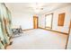Bright bedroom featuring neutral carpeting, wood trim and lots of natural light at 4533 W 600 N, Fairland, IN 46126