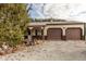 Large barn with neutral siding, brown garage doors and well-kept gravel at 4533 W 600 N, Fairland, IN 46126