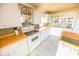 Cozy kitchen with white cabinets, butcher block countertops, island, and decorative accents at 4533 W 600 N, Fairland, IN 46126