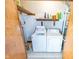 Utility room featuring washer and dryer hookups and convenient shelving at 4533 W 600 N, Fairland, IN 46126