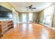 Cozy living room featuring hardwood floors, bright windows and neutral walls at 4533 W 600 N, Fairland, IN 46126