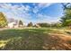 Expansive property with a house, barn, and lush lawn offers a peaceful and spacious country living experience at 4533 W 600 N, Fairland, IN 46126