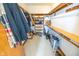 Walk-in closet featuring built-in shelving and ample storage space for an organized wardrobe at 4533 W 600 N, Fairland, IN 46126