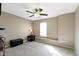 Bright bedroom with neutral tones, a ceiling fan, and a window seat, offering a serene retreat at 459 Dekalb Dr, Westfield, IN 46074
