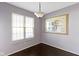 This dining area features hardwood floors and a window at 459 Dekalb Dr, Westfield, IN 46074