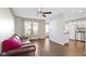 Comfortable living room with hardwood floors, a ceiling fan, and natural light at 459 Dekalb Dr, Westfield, IN 46074