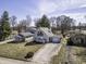 Charming home featuring varied rooflines and a long, gravel driveway at 4953 Mccray St, Indianapolis, IN 46224