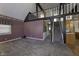 Spacious living room featuring a loft, carpet, and large windows at 4953 Mccray St, Indianapolis, IN 46224