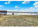 White barn featuring functional layout with gated areas; ideal for livestock at 5420 W Goeller W Rd, Columbus, IN 47201