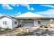 Barn offers a large garage door and covered area, perfect for equipment storage at 5420 W Goeller W Rd, Columbus, IN 47201