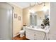 Well-lit bathroom features a shower, a vanity with sink, and ample storage space at 5420 W Goeller W Rd, Columbus, IN 47201