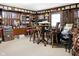 Unique bonus room showcases wooden walls, saddles and handcrafted decor, offering a distinctive and rustic charm at 5420 W Goeller W Rd, Columbus, IN 47201